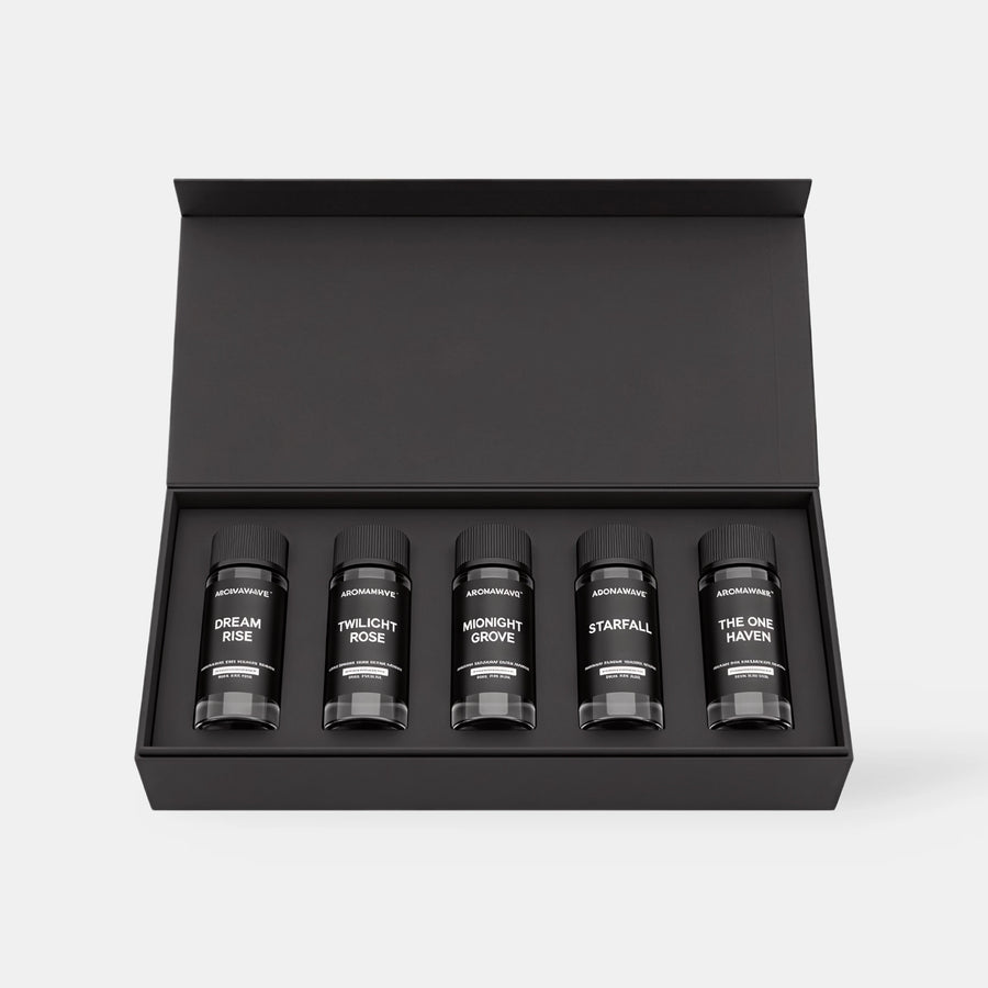 Open Aromawave Silk Bloom Premium Set showing five luxury fragrance oil bottles inside a black magnetic presentation box